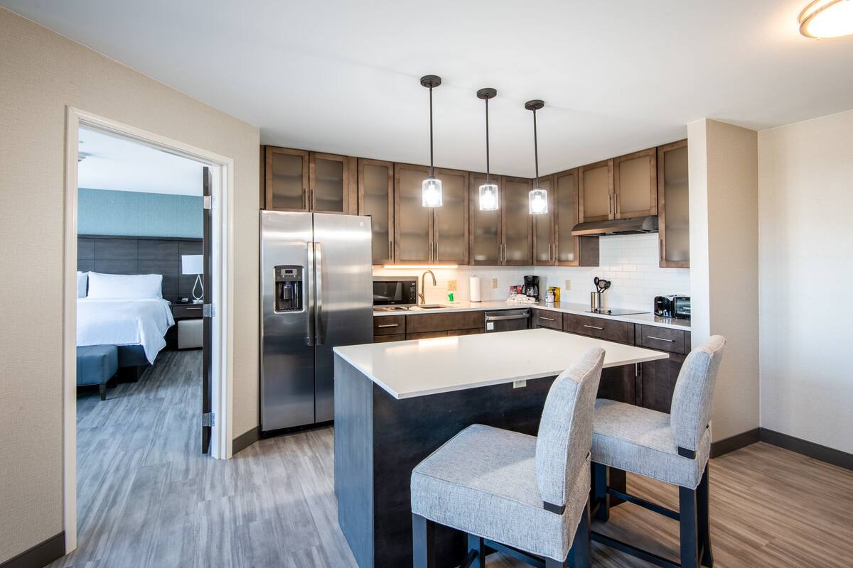 suite, 2 bedrooms, kitchen | 1 bedroom, premium bedding, desk, laptop workspace