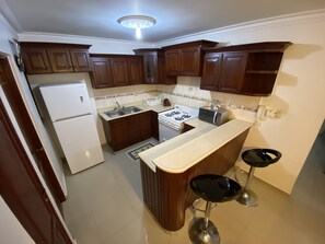 Fridge, microwave, oven, stovetop