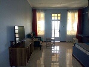 Desk, bed sheets - The Cradle Tented Camp (Lodwar)