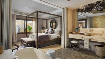 A modern bedroom with a canopy bed, a large mirror, a wooden ceiling, and a bathroom with a bathtub and sink.