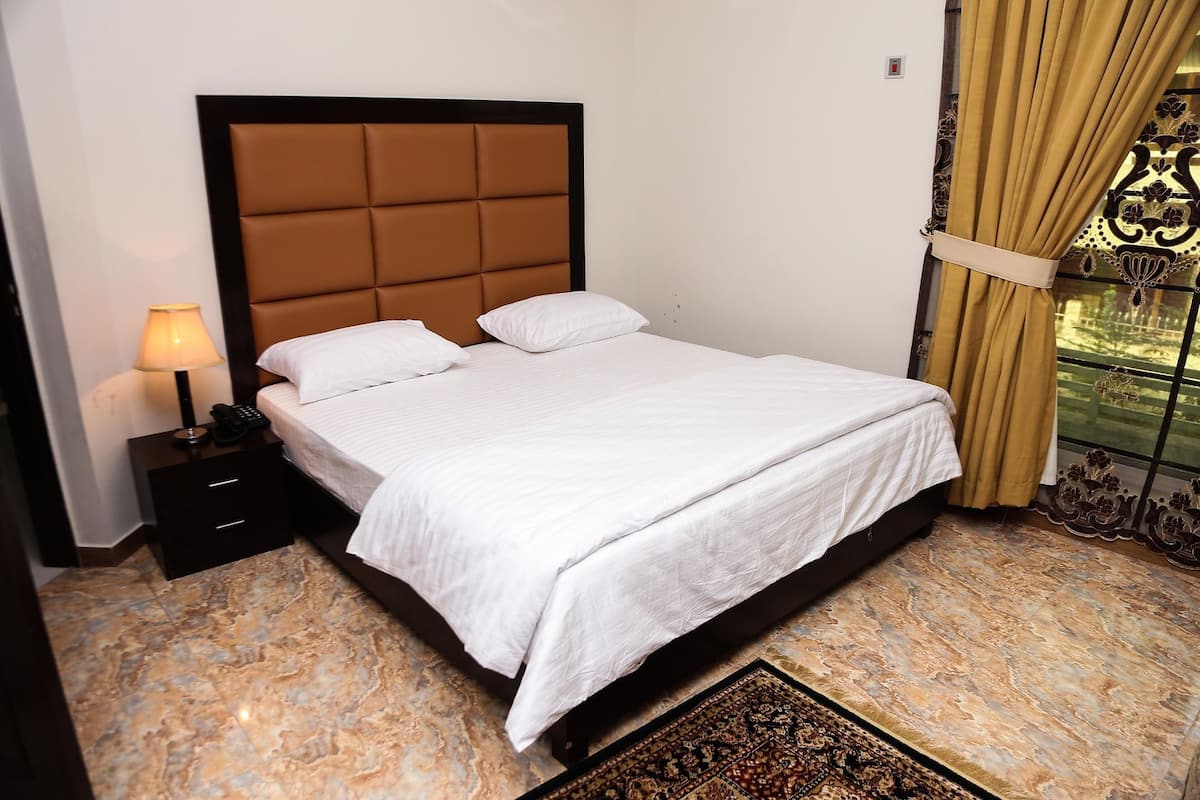 Chambre Quadruple Deluxe | 3 chambres, draps fournis