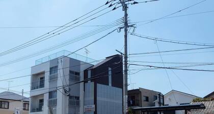 Self-catering accommodation with Wi-fi and amenities. 10 minutes from JR Kasuga Station. MIYUKIHOUSE201