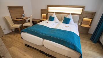 Hypo-allergenic bedding, desk, laptop workspace, cribs/infant beds