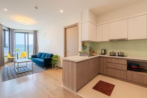 Apartment, 3 Bedrooms | Private kitchen | Fridge, microwave, stovetop