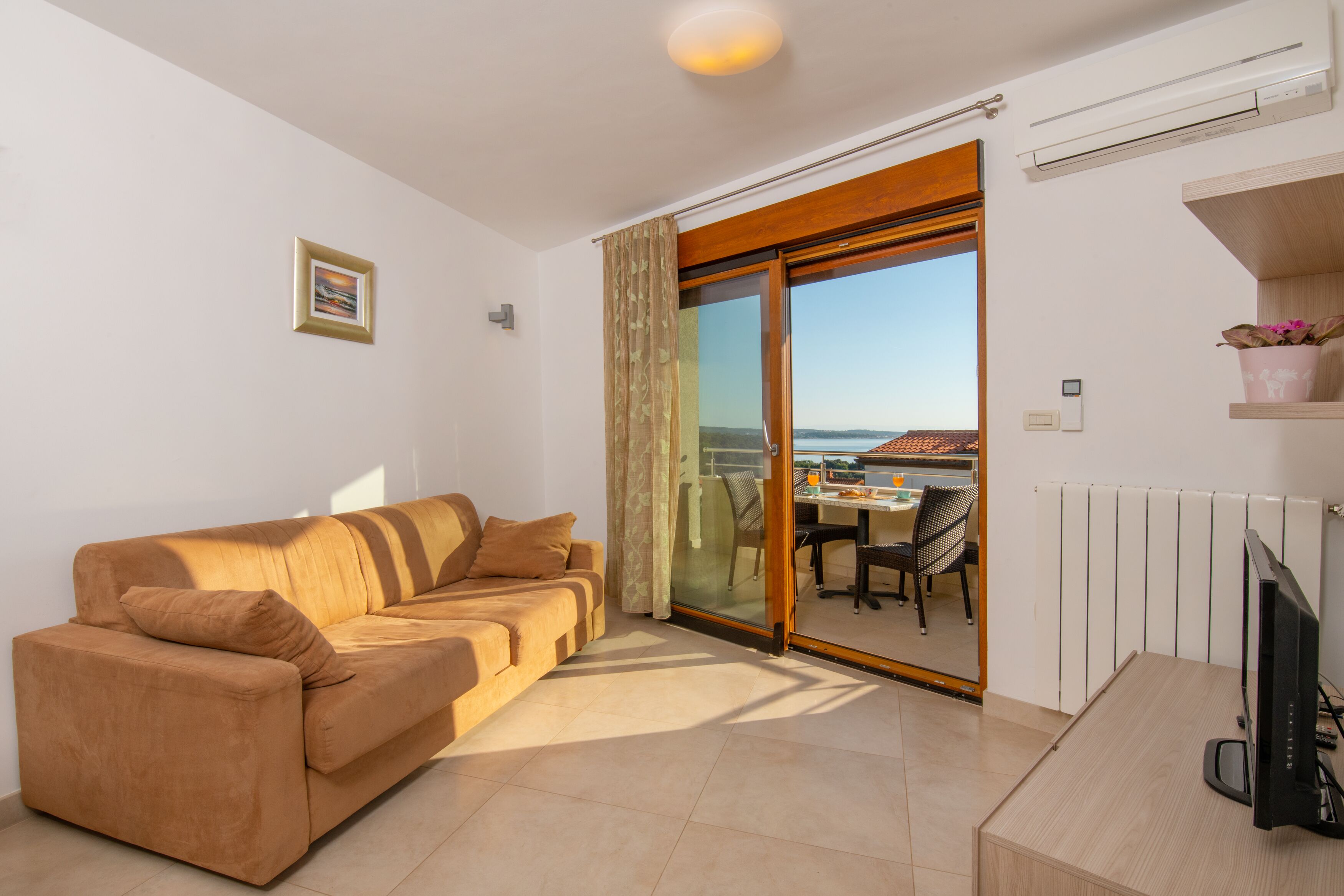 Superior Apartment, 1 Bedroom, Partial Sea View | Living area | Flat-screen TV