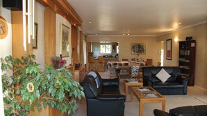 Family House, 4 Bedrooms | Living room | Flat-screen TV - Acorn Tree (Cape Town)