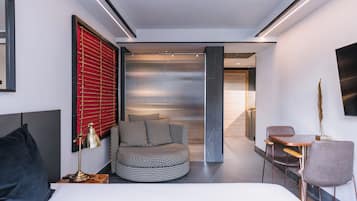 Junior Suite | Living area | 40-inch Smart TV with digital channels