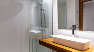 Hair dryer, towels, soap, shampoo