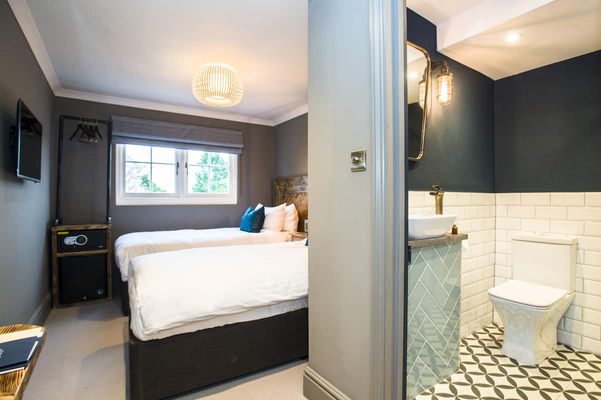In-room safe, desk, laptop workspace, blackout curtains