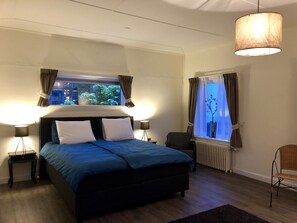 Premium bedding, down duvets, iron/ironing board, free WiFi