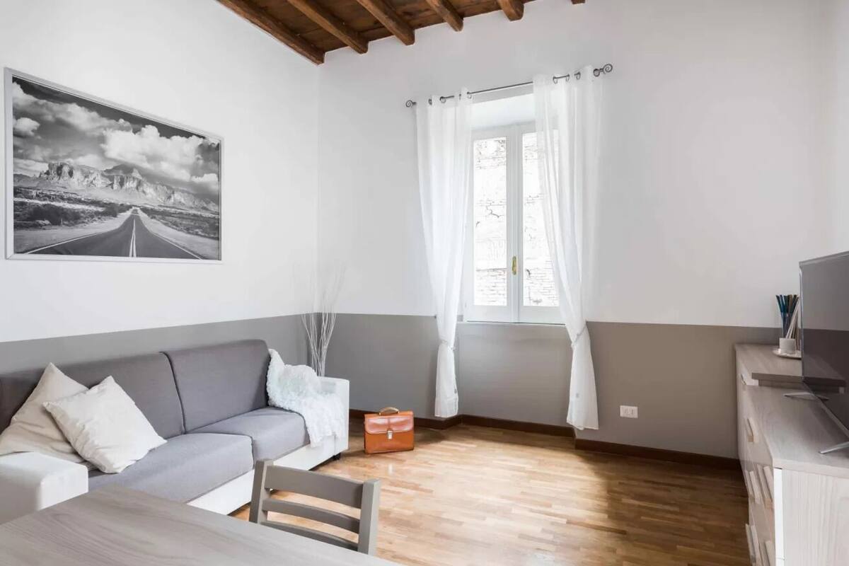 A World Aparts - 105 Pellegrino (via del Pellegrino 105) | Living area | Flat-screen TV