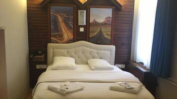 Standard Double Room | Minibar, desk, laptop workspace, iron/ironing board