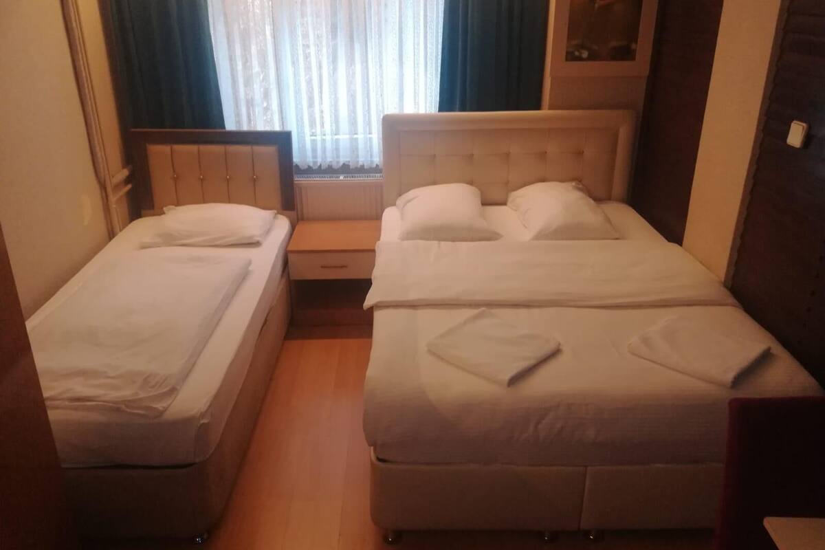 Family Double Room Single Use | Minibar, desk, laptop workspace, iron/ironing board (on request)