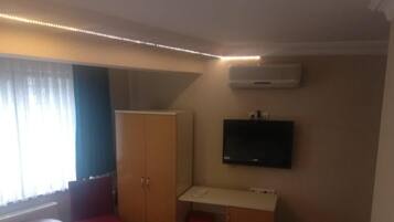 Minibar, desk, laptop workspace, iron/ironing board (on request)