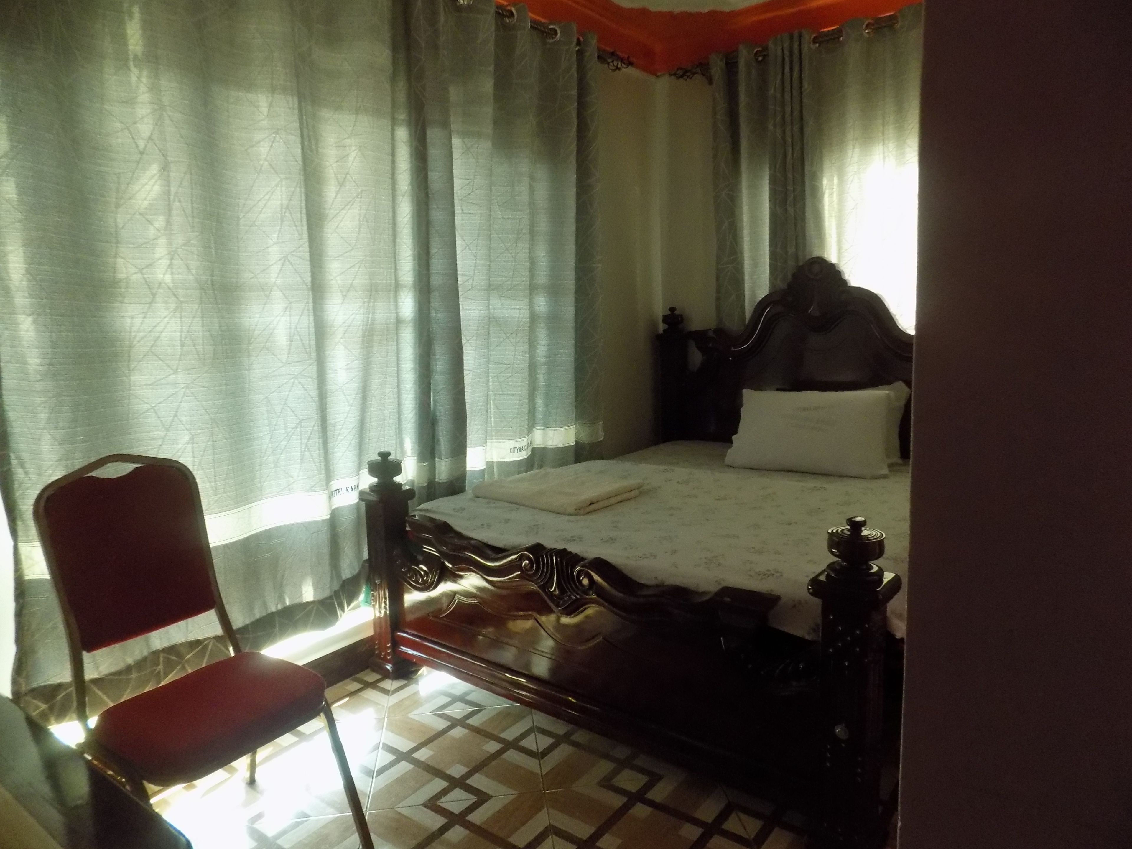Desk, laptop workspace, free WiFi, bed sheets