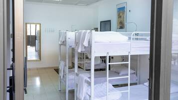 Desk, laptop workspace, free WiFi, bed sheets