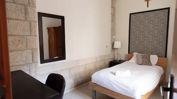 Desk, laptop workspace, free WiFi, bed sheets