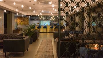 3 bars/lounges, rooftop bar