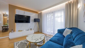 Appartement (D 28) | Coin séjour