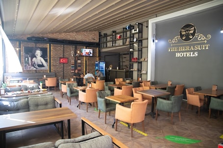 Restaurant. The Hera Suit Hotels