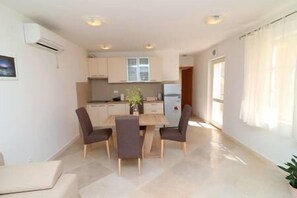 Fridge, toaster, cookware/dishes/utensils