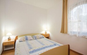 2 quartos, acesso à internet, roupa de cama