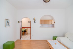 Apartment, 2 Bedrooms, Terrace, Sea View | Living area | 20-inch flat-screen TV with cable channels, TV - Apartments Ana & Bogdan (Postira)