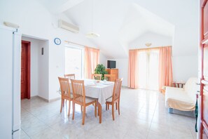 Apartment, 1 Bedroom, Balcony, Sea View | Living area