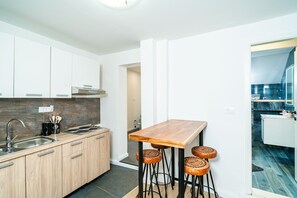 Fridge, stovetop, cookware/dishes/utensils