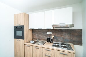 Fridge, stovetop, cookware/dishes/utensils