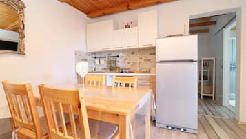 Fridge, stovetop, cookware/dishes/utensils