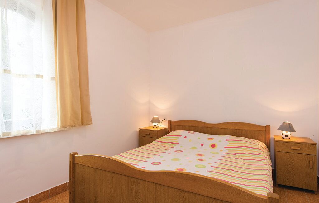 2 quartos, acesso à internet, roupa de cama