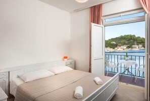 1 quarto, acesso à internet, roupa de cama