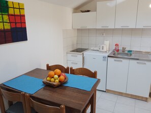 Fridge, stovetop, cookware/dishes/utensils