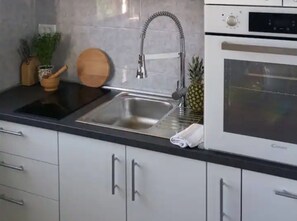 Fridge, microwave, oven, stovetop - Apartments Natasa- One Bedroom Apartment with Balcony (Supetar)