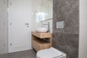 Hårføner og håndklær