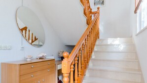 A staircase with wooden railings leading to an upper floor. - Villa Stella - Two Bedroom Apartment with Terrace and Sea View (Stella) (Splitska)