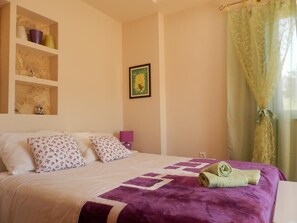 2 habitaciones, tabla de planchar con plancha, wifi y ropa de cama 
