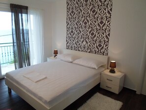 1 غرفة نوم ومكواة/لوح كي وواي فاي وملاءات أسرّة