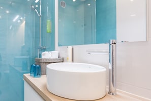 Hair dryer, towels, soap, shampoo