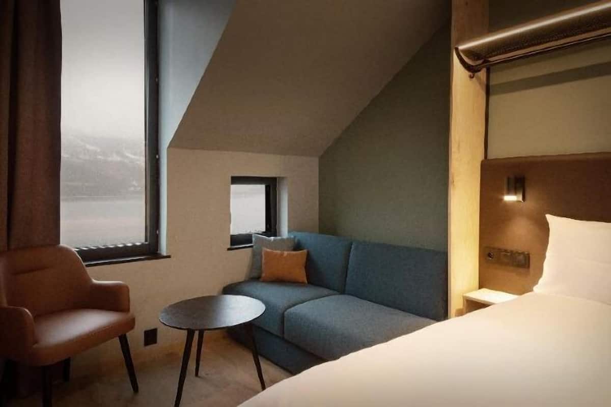 1 chambre, surmatelas, minibar, lits bébé (gratuits)