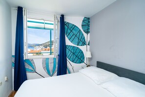 1 habitación, tabla de planchar con plancha, wifi y ropa de cama 