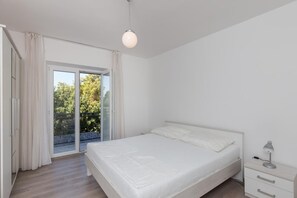 1 soverom, strykejern/-brett og sengetøy