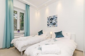 2 habitaciones, tabla de planchar con plancha, internet y ropa de cama 