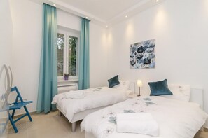 2 habitaciones, tabla de planchar con plancha, internet y ropa de cama 