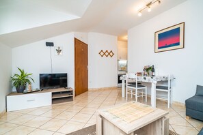 Fernseher, Kamin
