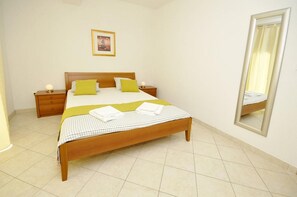 2 quartos, acesso de cortesia à internet, roupa de cama