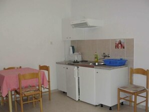Fridge, stovetop, cookware/dishes/utensils