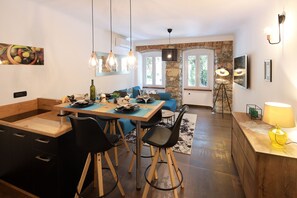Deluxe Apartment, 1 Bedroom (Sail 1) | Living area | Flat-screen TV