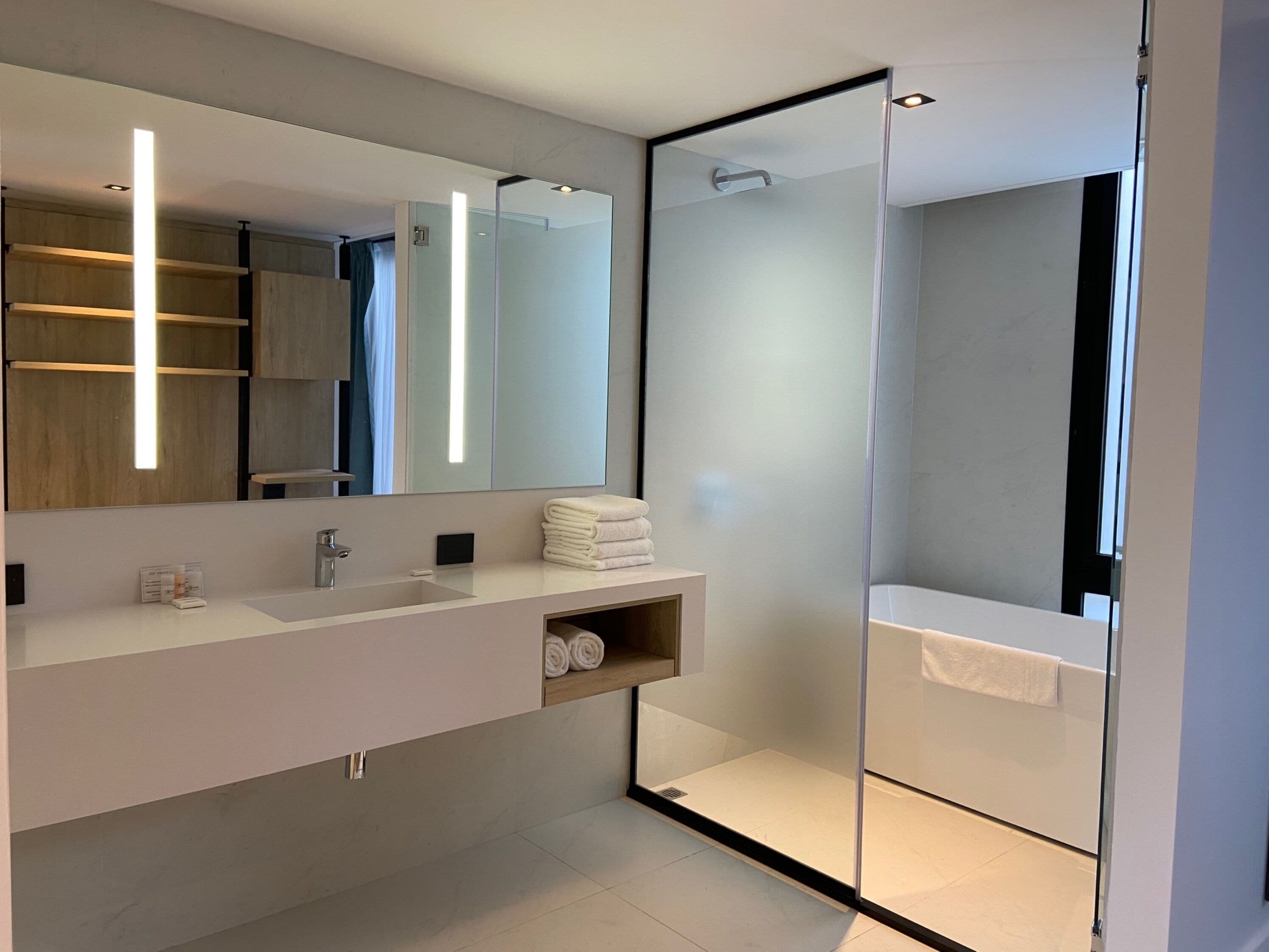 design studio suite, terrace | bathroom | combined shower/bathtub, deep-soaking bathtub, rainfall showerhead